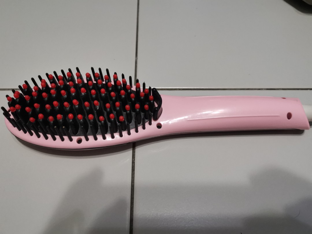 Ionised straightener brush top