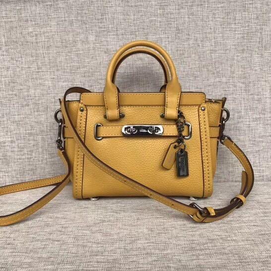 Coach swagger top yellow