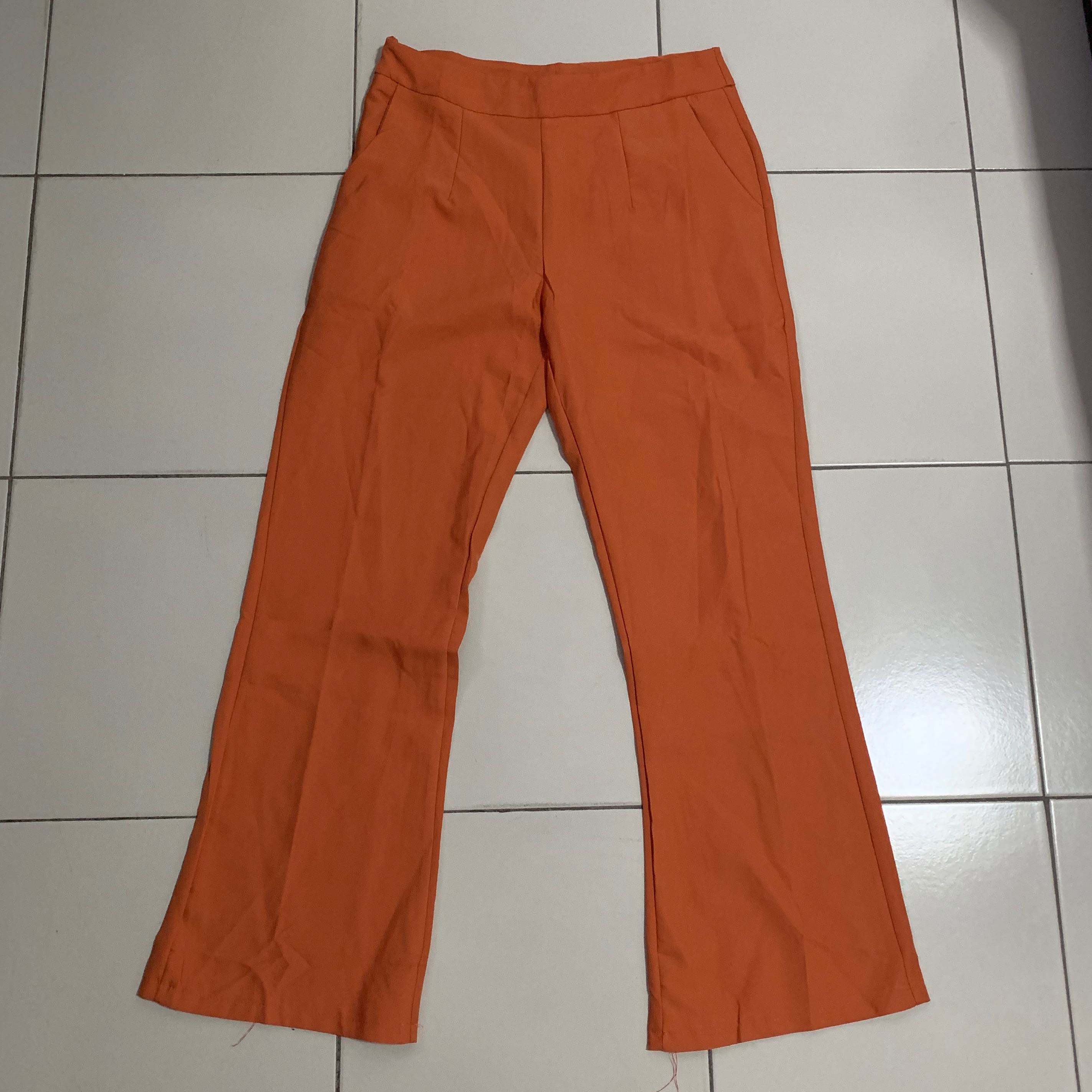 orange flare jeans