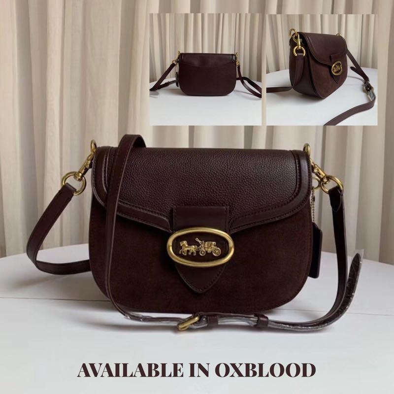 oxblood coach purse