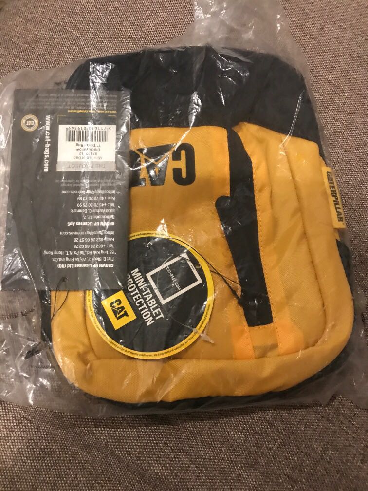 BN authentic caterpillar mini tablet bag 7 yellow Mobile Phones Gadgets Mobile Gadget Accessories Mounts Holders on Carousell