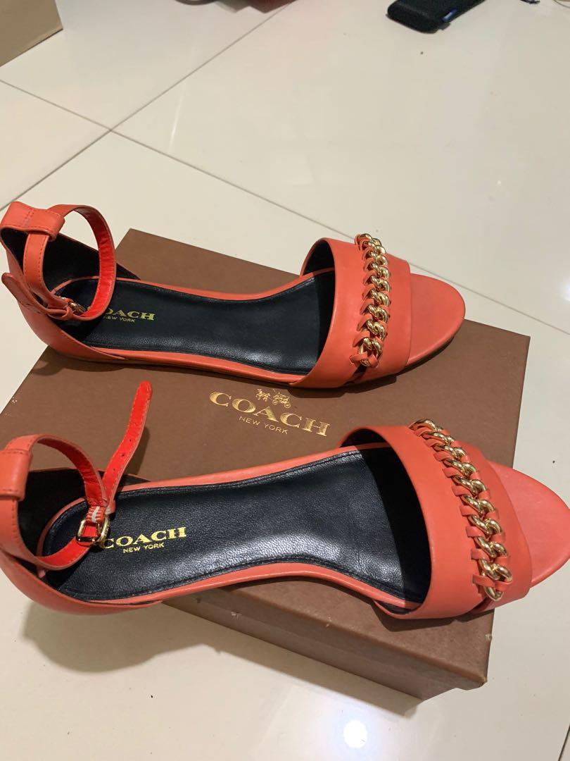 coach sandals (Category: Flats & Sandals) located in Quezon City. Submitted by len16 (Listing ID 258292497, Image 2). Description: unused coach sandals coral in color size 8 with box and care card.
