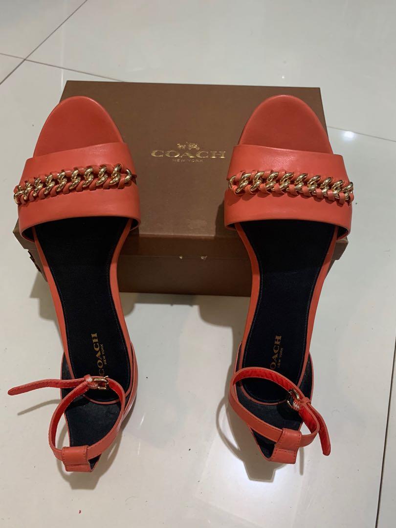 coach sandals (Category: Flats & Sandals) located in Quezon City. Submitted by len16 (Listing ID 258292497, Image 1). Description: unused coach sandals coral in color size 8 with box and care card.