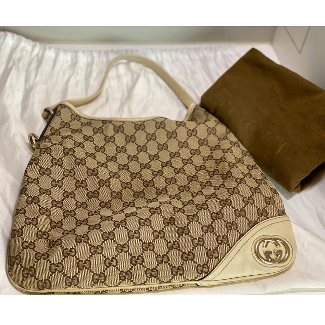 Pre Owned Authentic Gucci Britt GG Canvas Hobo Bag Price reduced