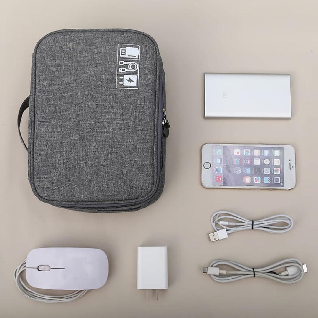 GADGET BAG TRAVEL ORGANIZER (Category: Other Accessories) located in Manila. Submitted by christimjose09 (Listing ID 258536272, Image 1). Description: Product details: ✔️It has two compartments with multiple elastic bands and mesh pockets to store your various electronic accessories, like charger, hard drive, headphones, batteries, mouse and other computer accessories. ✔️The storage bag is made of heavy-duty, durable and waterproof fabric. ✔️It i