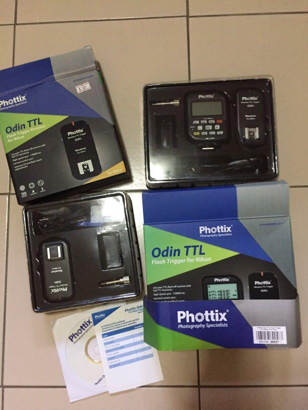 Phottix Odin Flash trigger & receiver Twin Pack (Nikon) (Category: Flashes) located in Imus. Submitted by sewitstina (Listing ID 258502857, Image 1). Description: Twin pack trigger and receiver kit for Nikon. Allows you to trigger 2 speedlights for added control of your light. Selling because I am shifting to a different system. This pack includes 1 flash trigger and 2 receivers. The trigger and receiver set was hardly used and the second receive