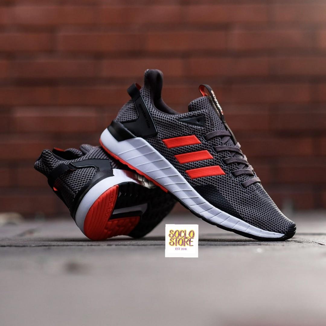 Adidas questar ride black orange on sale