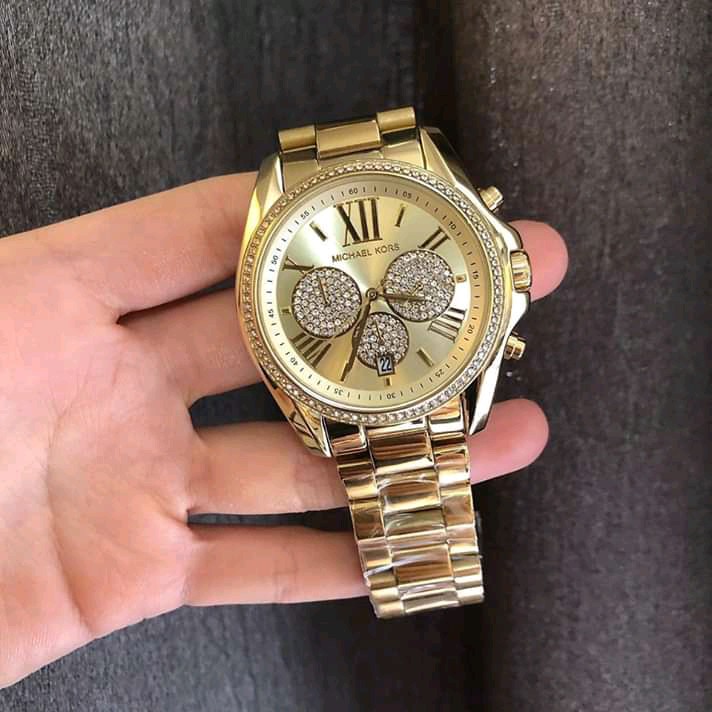 mk gold watch