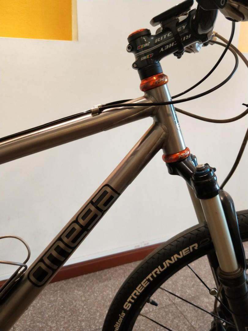 Omega titanium bike top
