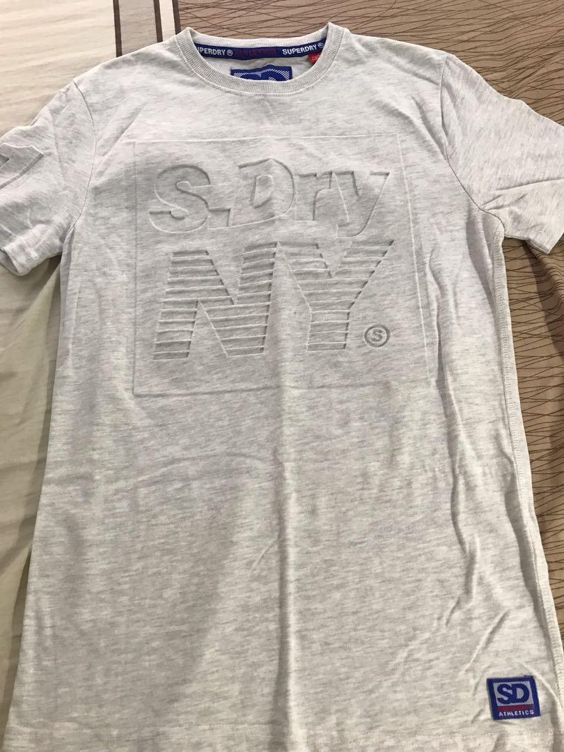 Superdry Tee (Category: Tshirts & Polo Shirts) located in Singapore. Submitted by hypelab (Listing ID 258671521, Image 2). Description: Brand new Superdry tshirt/tee Condition: 10/10 Embroidered logo and soft marble design which is a super cute colour Fits true to size .