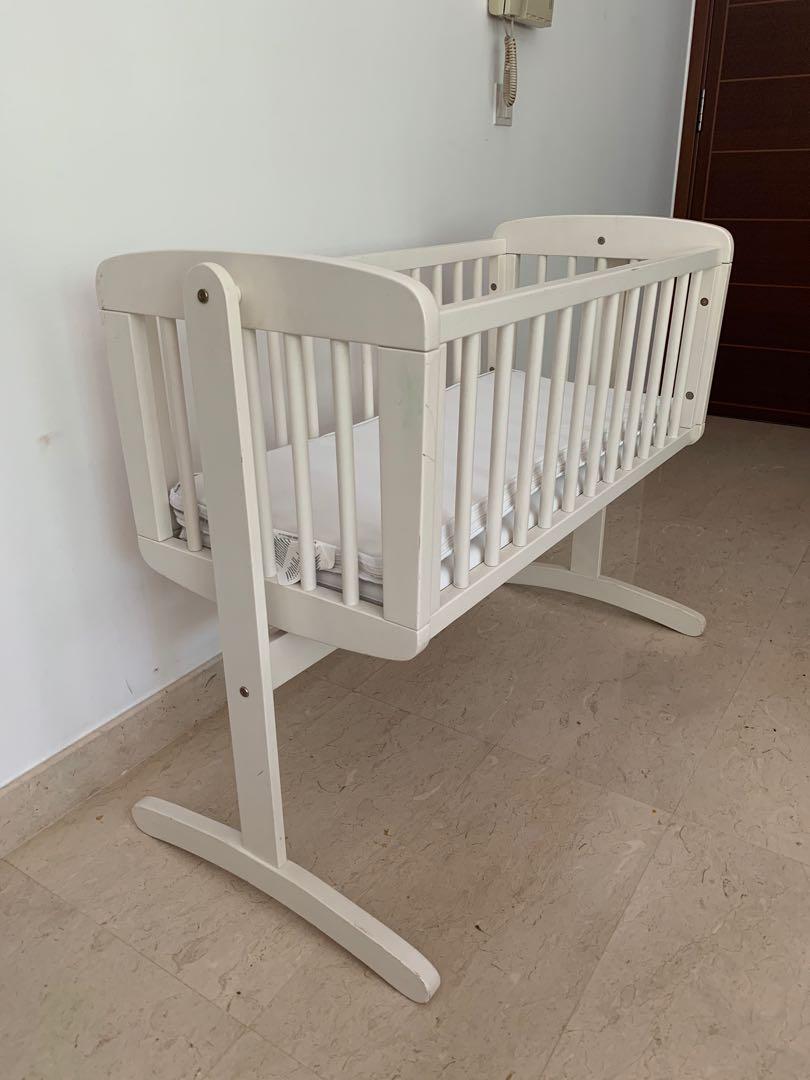 swinging crib mattress mothercare