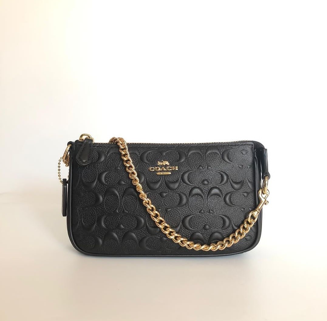 Coach embossed large wristlet Bags and purses