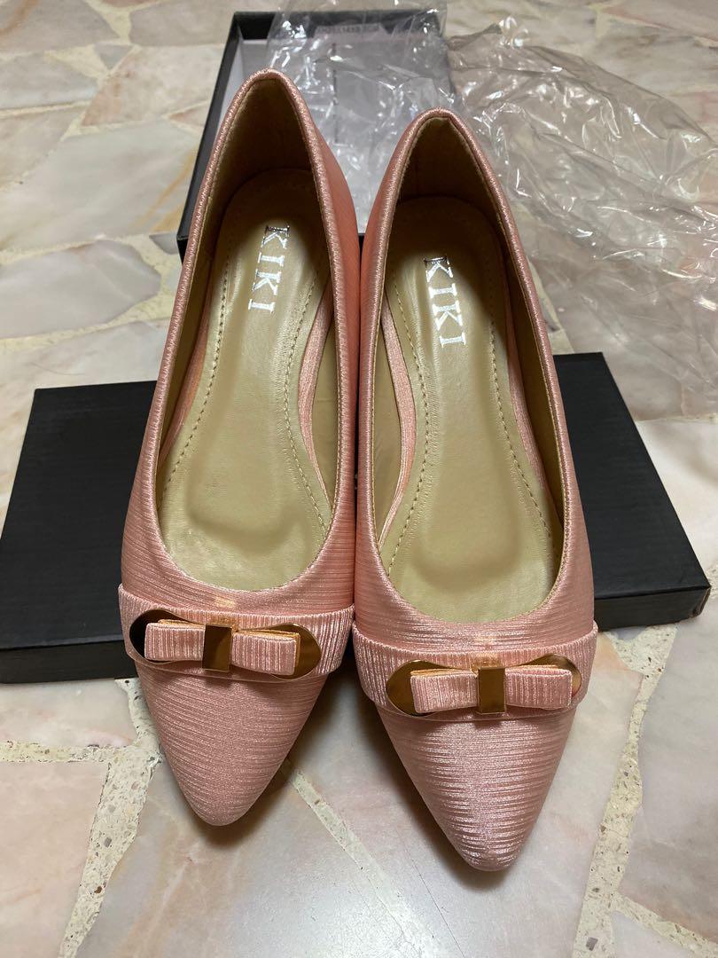 pink flat pumps