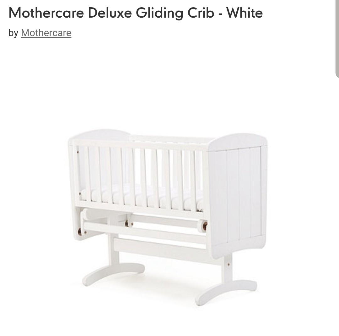 white gliding crib
