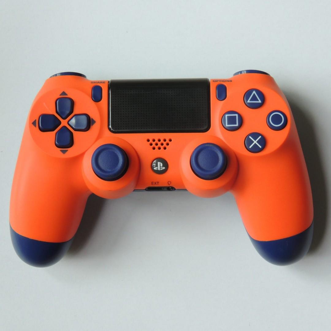 black and orange ps4 controller