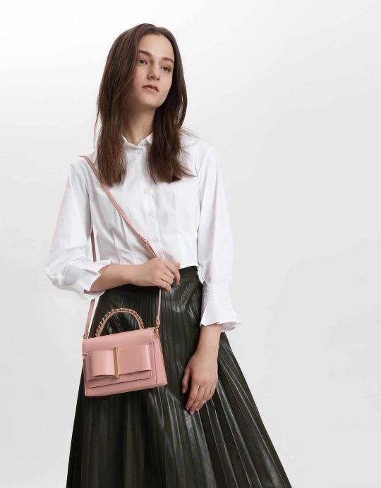 charles & keith chunky metal top handle bow flap bag