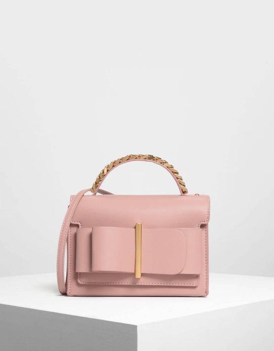 charles & keith chunky metal top handle bow flap bag