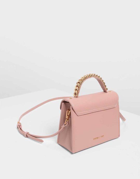 charles & keith chunky metal top handle bow flap bag