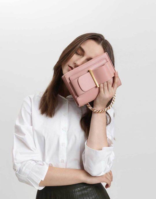 charles & keith chunky metal top handle bow flap bag