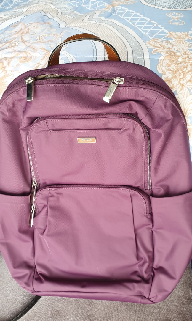 pink tumi backpack