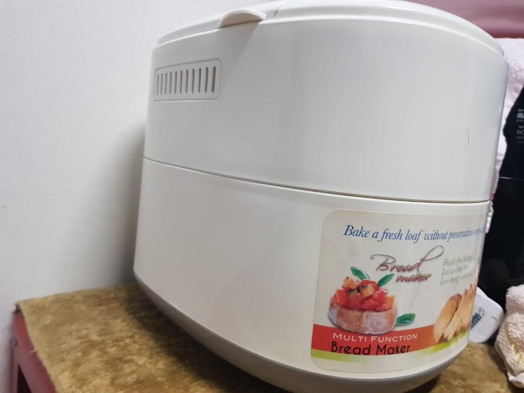 Bread Maker (Category: Coffee Machines & Makers) located in Singapore. Submitted by kennychungcs (Listing ID 259538735, Image 3). Description: Hassle free bread baking machine with 14 baking functions and 15 hours timer Less waiting time, less energy consumed. Capacity 750g..