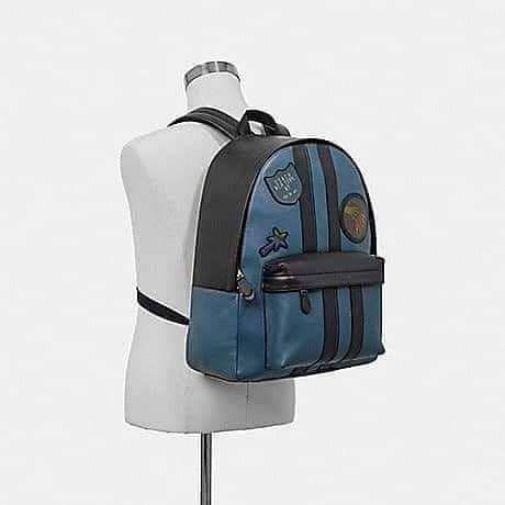 coach Charles backpack with wizard of oz patches