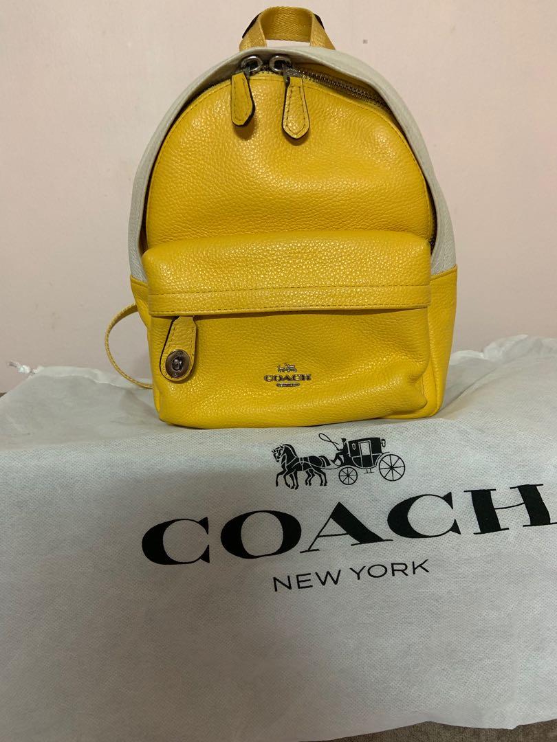 yellow coach backpack