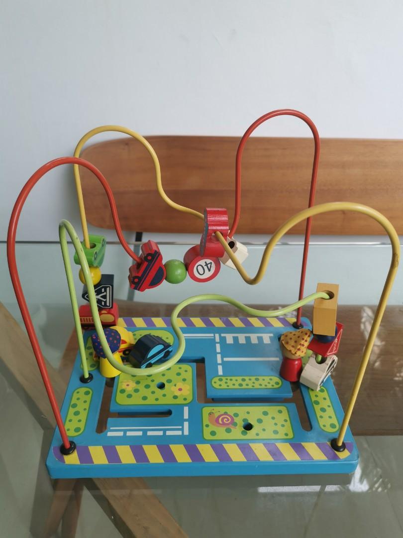 Activity Cube (Category: Infant Playtime) located in Singapore. Submitted by dawit (Listing ID 260063917, Image 1). Description: Activity toy. Wooden. Pre loved. Looking for new owner. Good for training toddlers psychomotor skills. $15.