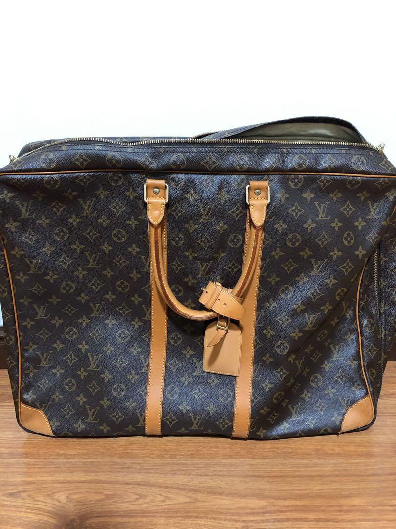 Lv monogram best sale travel bag