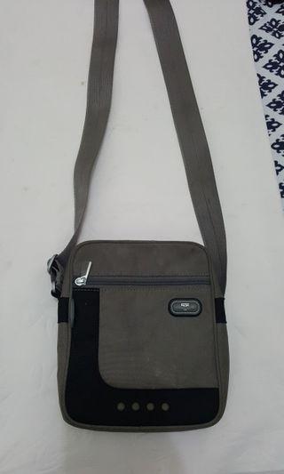 Original Tumi sling bag