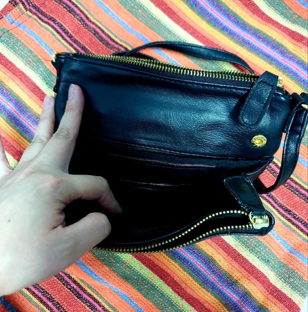 Christian Siriano Black Sling Bag (Category: Cross-body Bags) located in Manila. Submitted by tipsytwists (Listing ID 260353119, Image 2). Description: 💗Mint pre-loved condition. Used only once💗 💗SF not included💗.