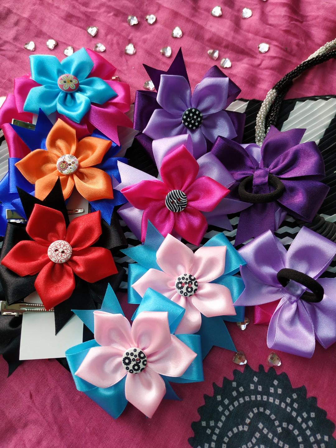 12 pcs. Flower plus Bow Hair Accessories (Category: Hair Accessories) located in Taytay. Submitted by ladiesbazaar (Listing ID 260312231, Image 2). Description: You'll get one dozen (design of your choice) for just Php 200!!! Very affordable, perfect girft for birthday, Christmas, even for giveaways or souvenirs . So cute when worn. Note: Requires Payment (half or full) before making it. Shipping Fee is 60 pesos to 75 depends on the quantity. (Fo