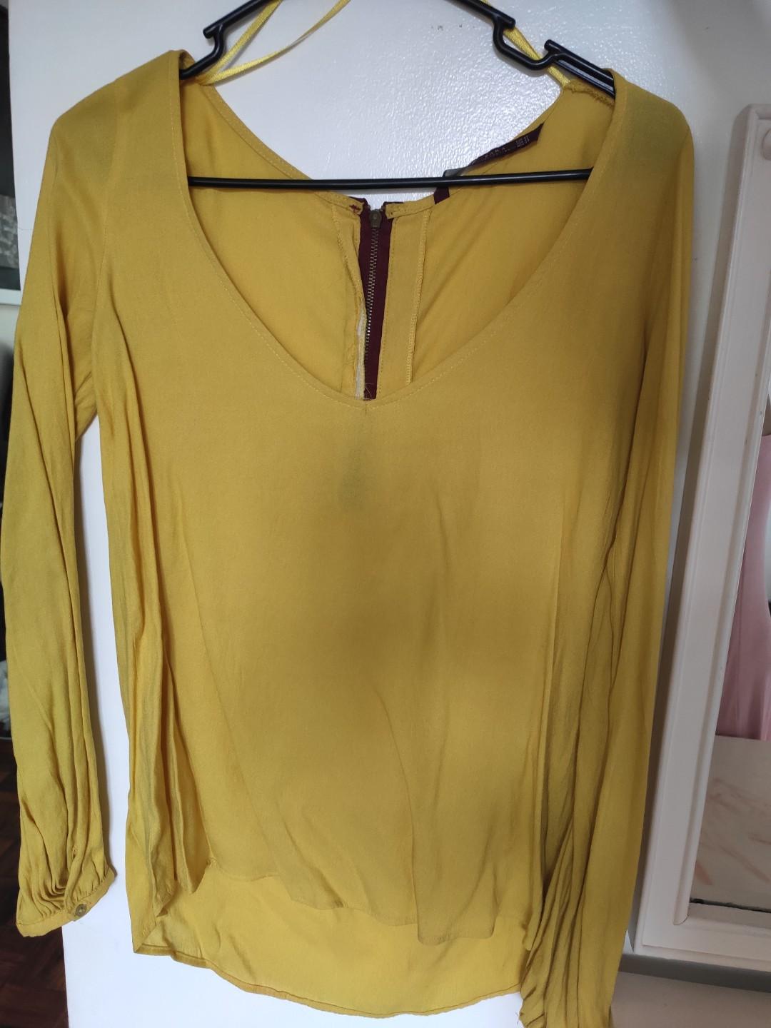 Zara Yellow Plunging Long Sleeves (Category: Longsleeves) located in Makati City. Submitted by kerlyfry (Listing ID 260315105, Image 1). Description: .
