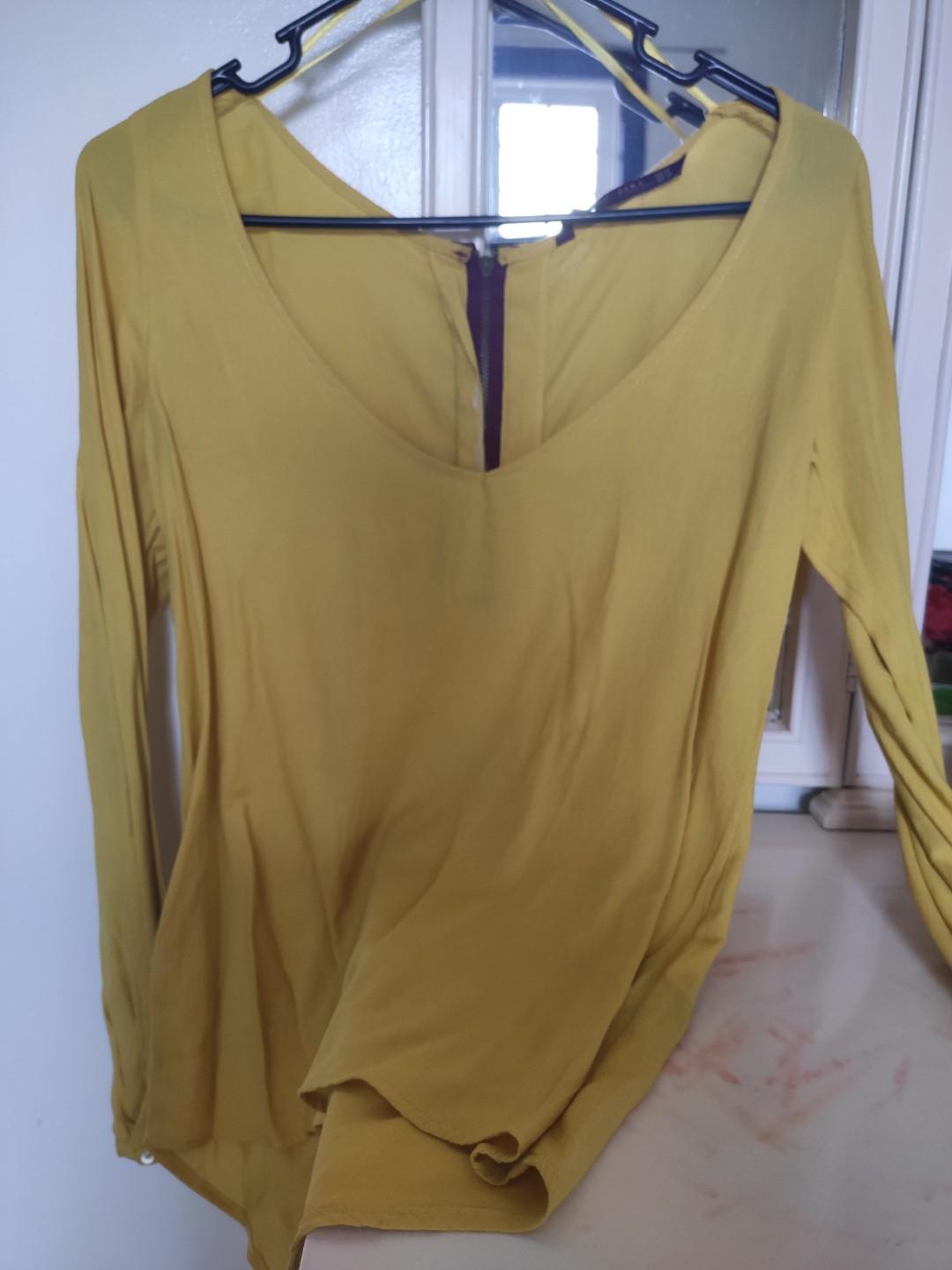Zara Yellow Plunging Long Sleeves (Category: Longsleeves) located in Makati City. Submitted by kerlyfry (Listing ID 260315105, Image 2). Description: .