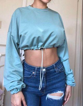 Cropped crew neck sweater
