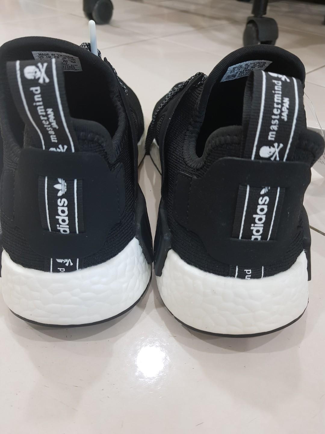 Nmd mastermind original deals vs fake