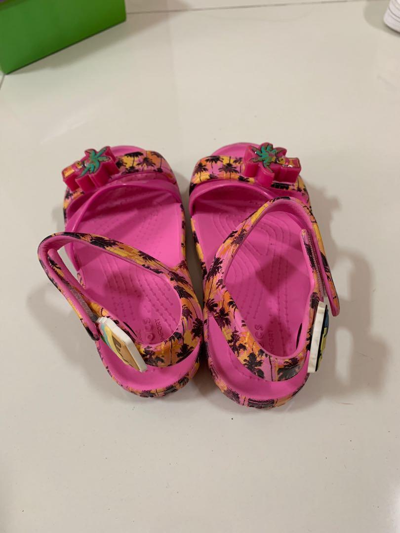 pink crocs with palm trees
