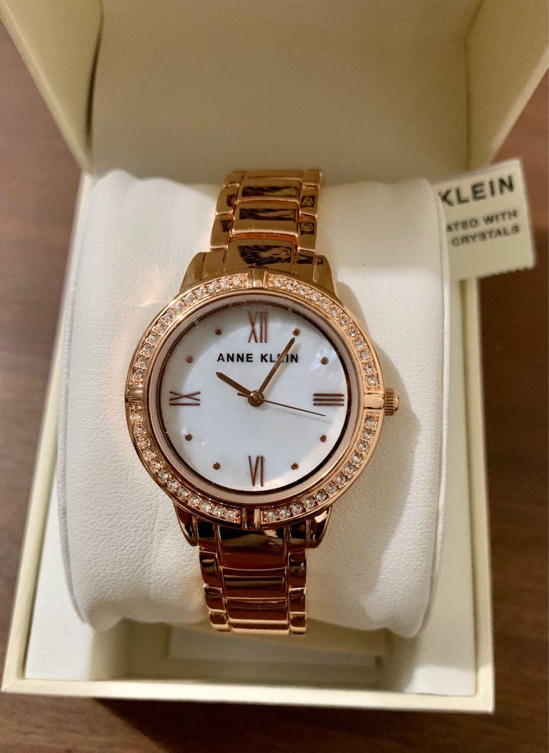 Anne klein gold watch with swarovski crystals top