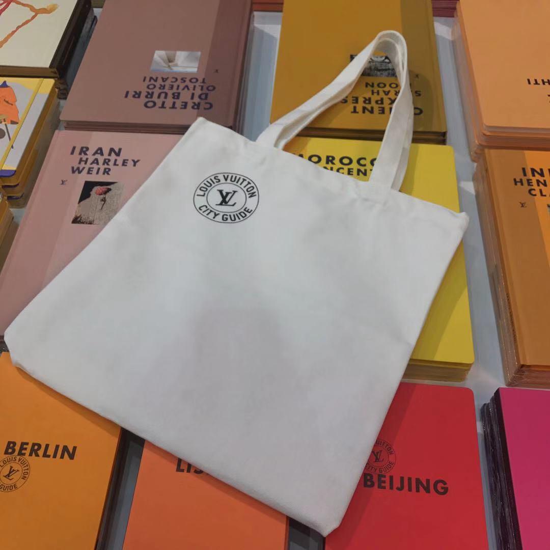 louis vuitton city guide tote bags