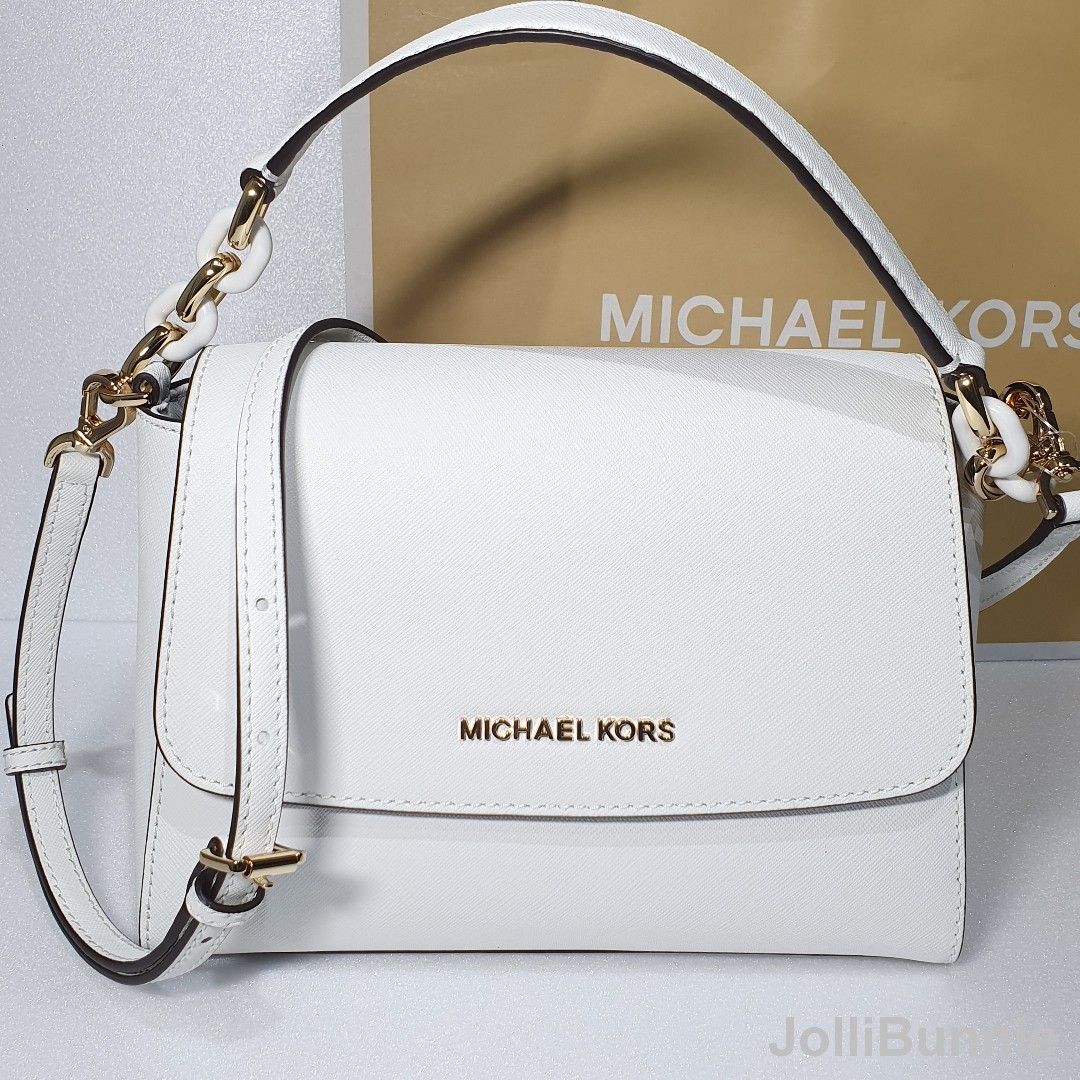 White michael hotsell kors crossbody purse
