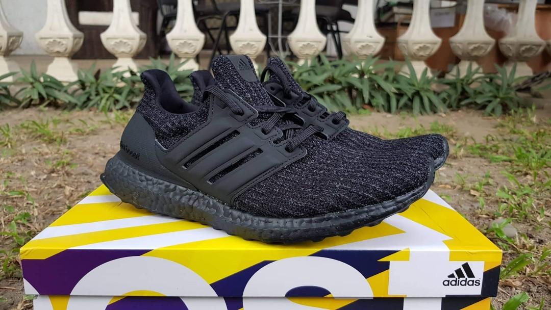 ultra boost triple black active red