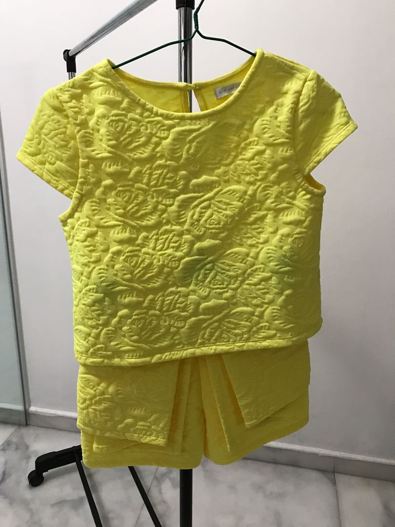 yellow top and shorts
