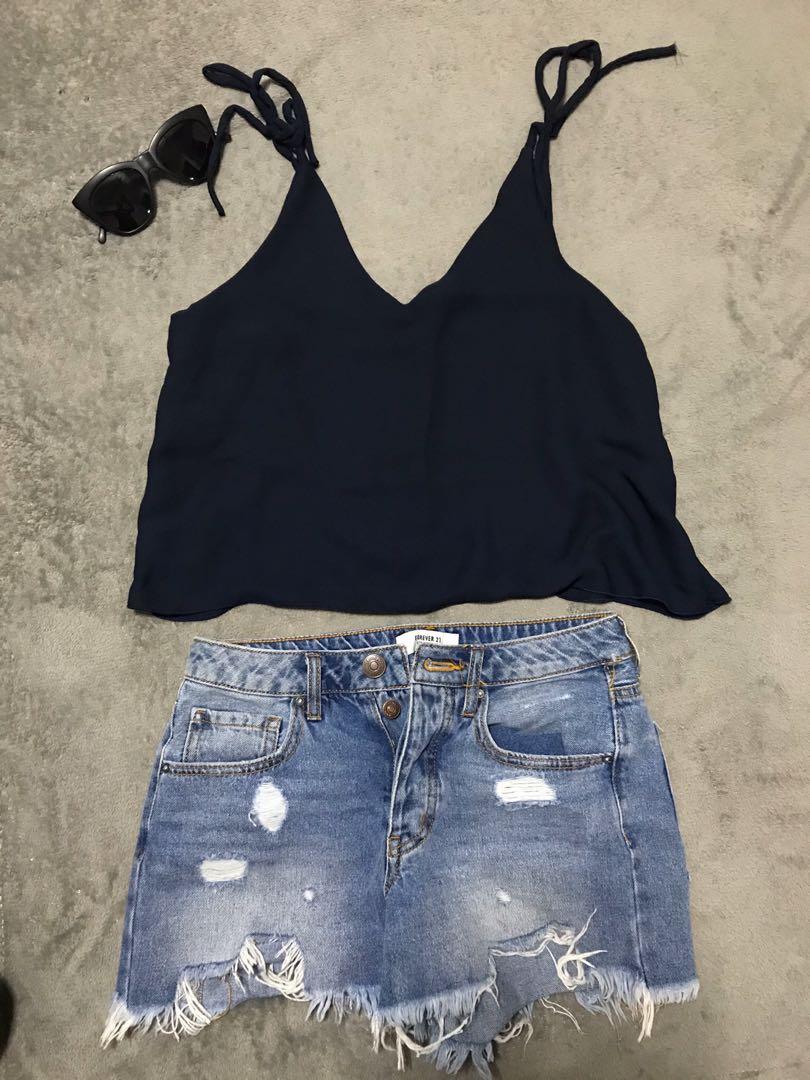 Navy blue top (Category: Sleeveless) located in Cainta. Submitted by karentomas (Listing ID 261666914, Image 1). Description: Navy blue sexy top.