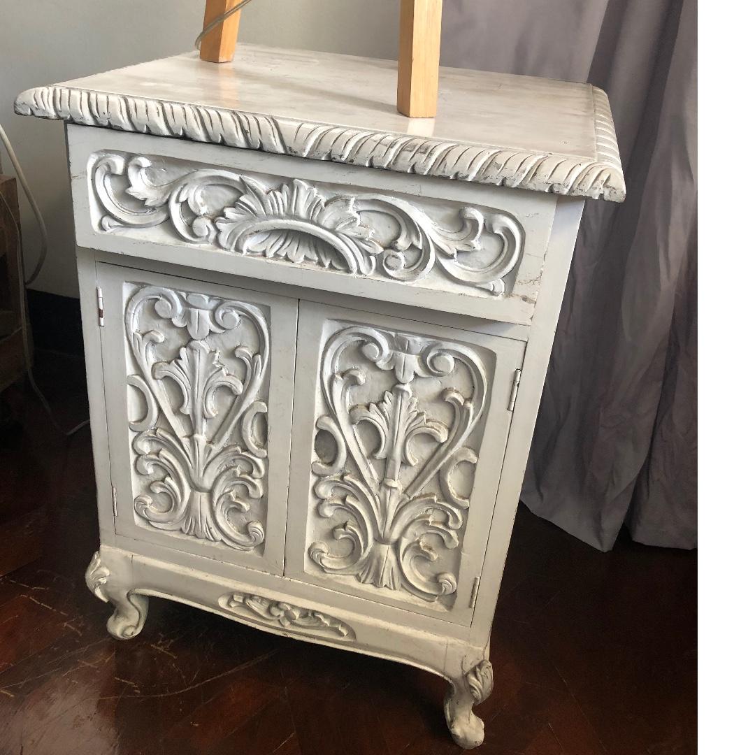 ornate wooden side table (Category: Tables & Sets) located in Paranaque City. Submitted by jennyfurn (Listing ID 261556113, Image 2). Description: Ornate white wood carved side table 2pcs Dimensions- 19”Lx16”Wx25”H P8000 each No lowballers please..