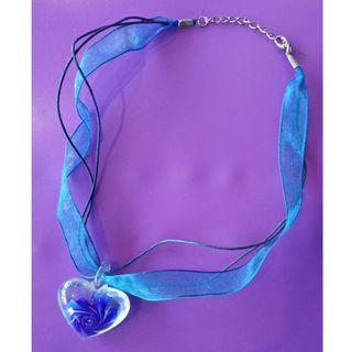 blue choker with flower heart