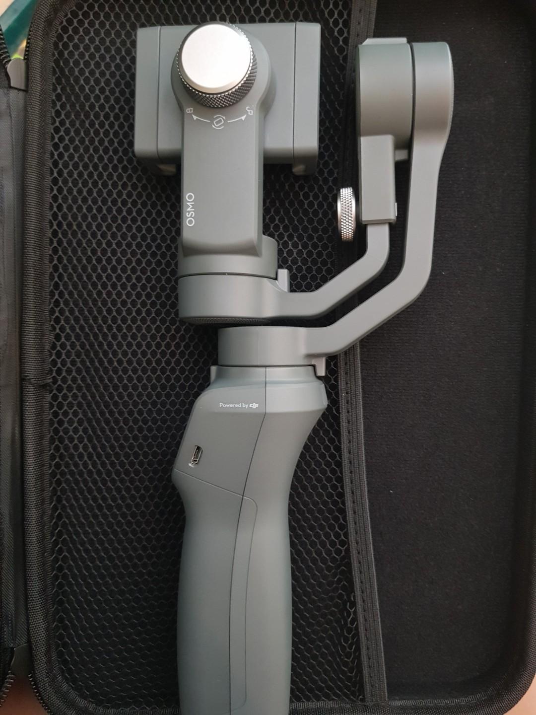 HOT SALE OSMO GIMBAL (Category: Mounts & Holders) located in Taguig. Submitted by ashloome (Listing ID 261730764, Image 1). Description: DJI OSMO Mobile 2 Osmo Gimbal, almost brand new, slightly used. Comes with a molded case. (Check picture) Original box not available. We left it in the US. More info about the item thru this link: https://www.dji.com/osmo-mobile-2 For pick-up, u may use lalamove or grab. Location: Taguig.