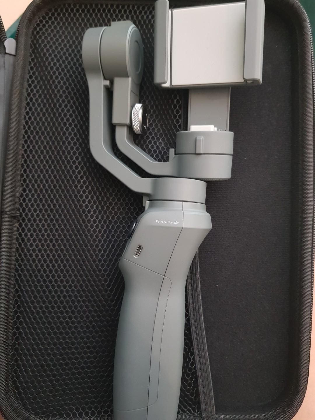 HOT SALE OSMO GIMBAL (Category: Mounts & Holders) located in Taguig. Submitted by ashloome (Listing ID 261730764, Image 2). Description: DJI OSMO Mobile 2 Osmo Gimbal, almost brand new, slightly used. Comes with a molded case. (Check picture) Original box not available. We left it in the US. More info about the item thru this link: https://www.dji.com/osmo-mobile-2 For pick-up, u may use lalamove or grab. Location: Taguig.