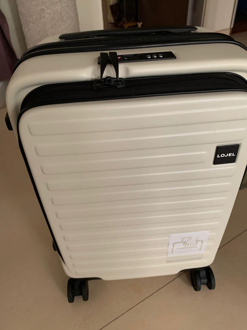 white cabin size suitcase