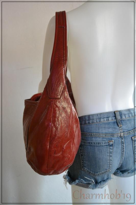 Authentic COACH red patent leather hobo bag (Category: Luxury Bags & Wallets) located in Cagayan de Oro. Submitted by real_luxe (Listing ID 262067942, Image 2). Description: MATERIAL: MEASUREMENT: HANDLE: DETAILS: INCLUSION: ORIGIN: CONDITION: AUTHENTIC: SHIPPING: JRS Express PAYMENT: BPI, BDO, G-Cash, Palawan, Cebuana, Mhluillier etc. NOTE: Kindly read the Description for the items condition and Authenticity. Reservation is only up to three days