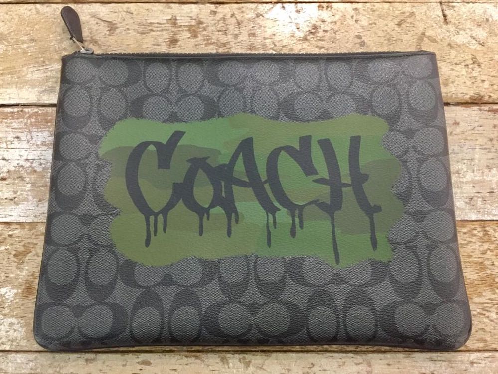 Coach online graffiti clutch